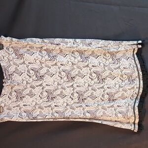 Angie brand paisley print flowy rayon skirt. Size Small with split on each side.